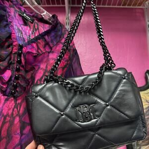 Black vegan leather quilted handbag